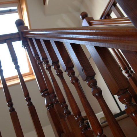 Staircase banister leading to loft conversion
