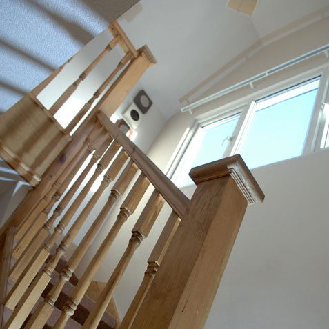 Staircase banister leading to loft conversion